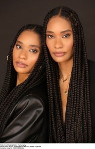 Authors Amber and Danielle Brown; two Black women wearing long box braids and black tops