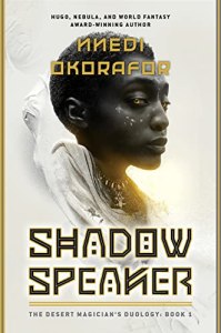 SHADOW SPEAKER by Nnedi Okorafor book cover: profile view of an African female with short cropped hair, glowing eyes, wearing a white top